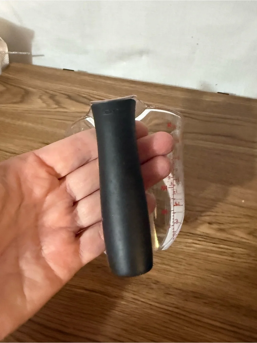 Oxo Clear Plastic Measuring Cup with Black Handle and Red Markings